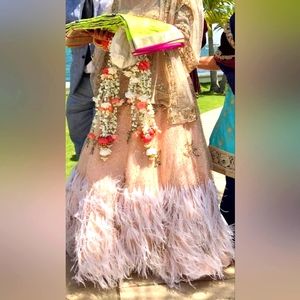 Wedding lahenga with feathers